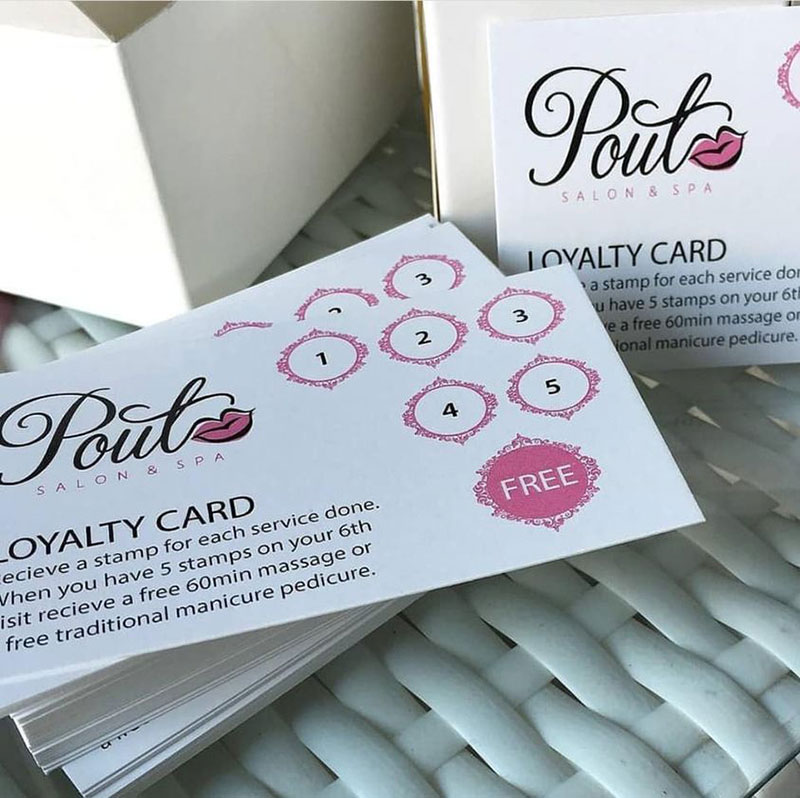 salon and spa loyalty card that uses a pink color palette