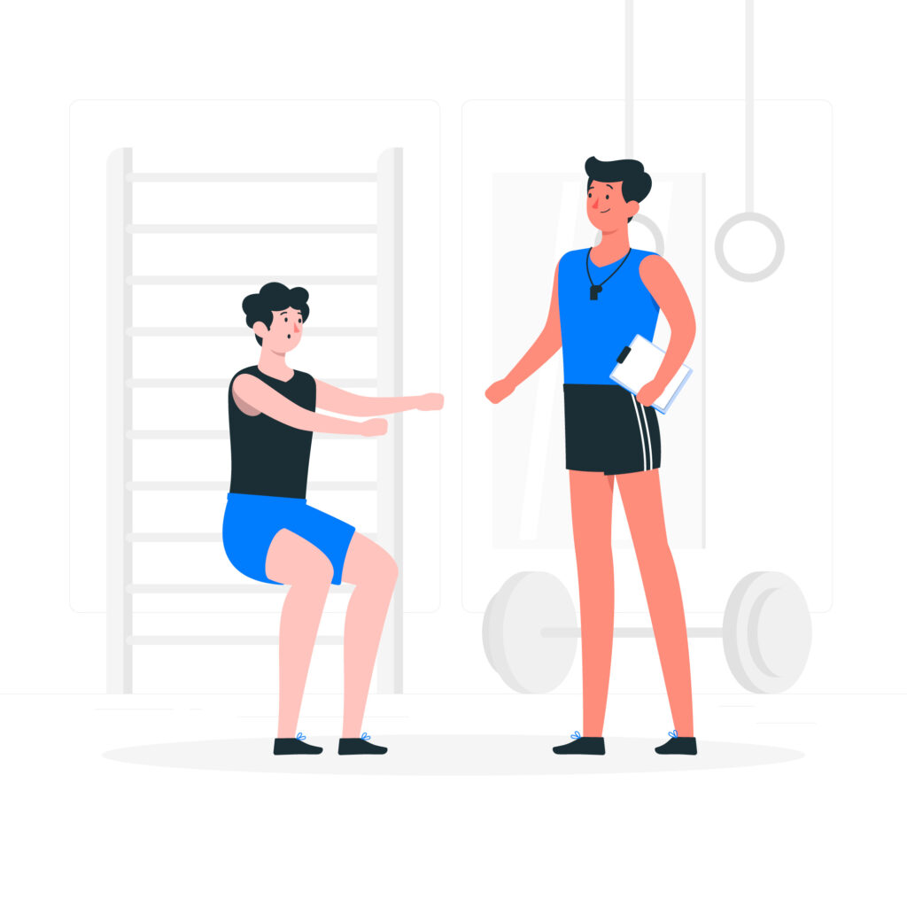 Personal trainer training a client in a gym
